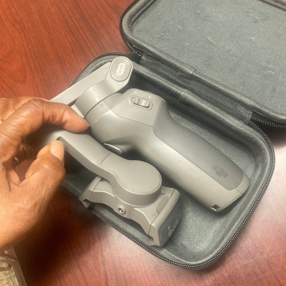 OSMO mobile 3, a foldable gimbal tripod includes carrying case.